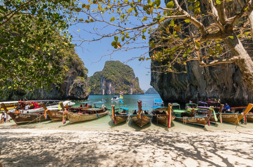 Boats parked on a Thai beach