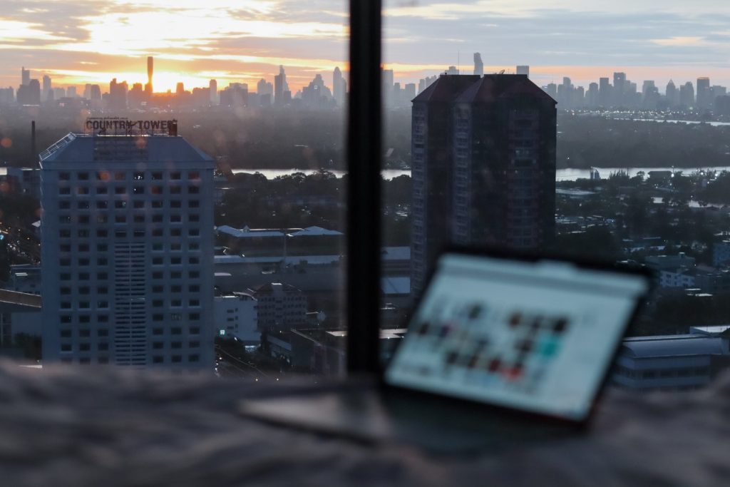 Laptop with skyscrapers in the background